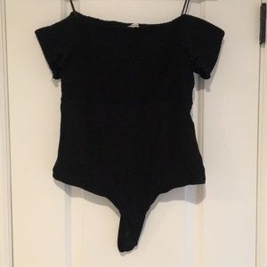 Off the shoulder smocked black body suit